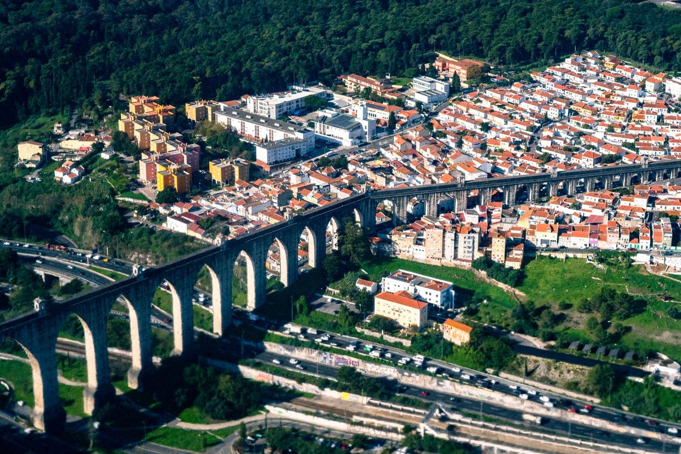 An aqueduct and a town seen from above