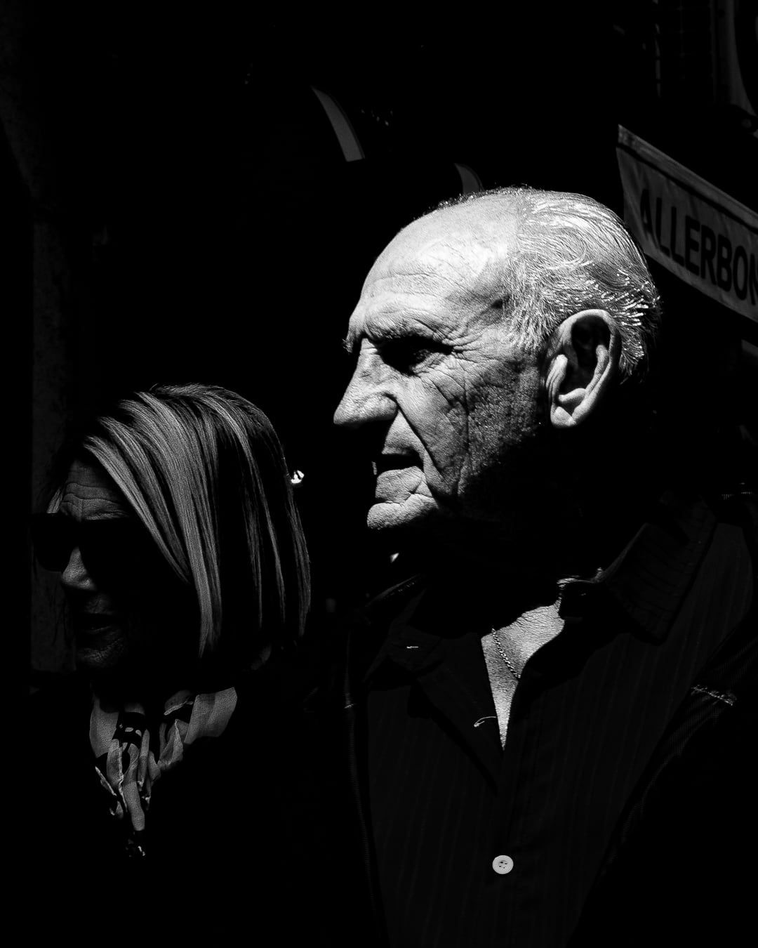 A man and a woman in profile